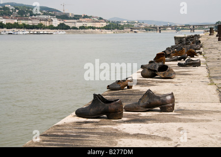 Shoes on the Danube - a memorial to the victims of the Arrow Cross Militiamen during WW2. Stock Photo