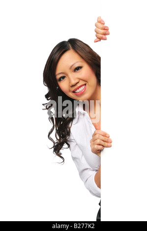 Gorgeous asian businesswoman holding blank sign isolated on white Stock Photo