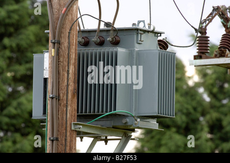 electricity supply transformer on a pole in UK Stock Photo