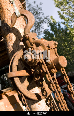 Rusting Pulley Block and tackle hoist. Stock Photo