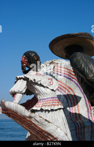 One the bronze public sculptures in Puerto Vallarta's Malecon depicting a Mexican couple in the traditional Tapiato Dance Stock Photo