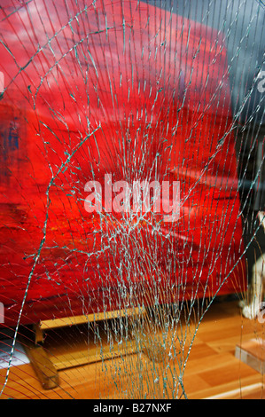 Broken glass in shop window Stock Photo
