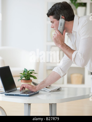 Man talking on telephone Stock Photo