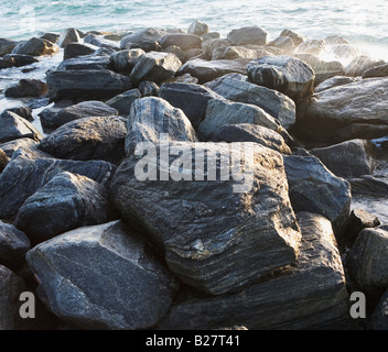 Rocks in front of water Stock Photo