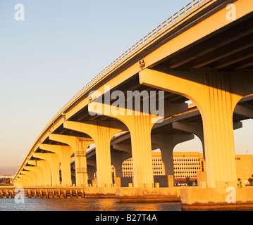 Low angle view of elevated highway over water Stock Photo