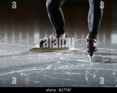 Male speed skater on ice Stock Photo