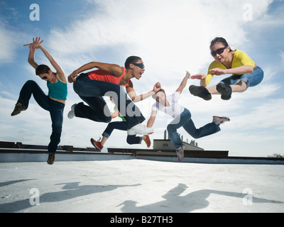 Multi-ethnic group performing modern dance Stock Photo