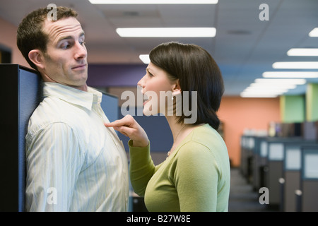 Businesswoman yelling at businessman Stock Photo
