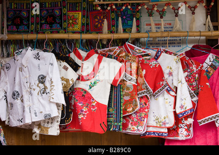 Chinese silk clothing souvenirs on sale in Ping An near Guilin China Stock Photo