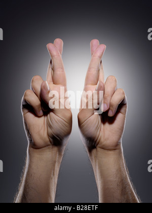 Keep Both Fingers Crossed Stock Photo - Alamy