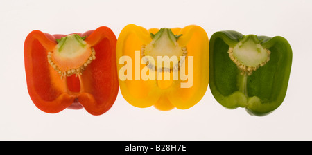 Halved yellow  red green  bell pepper capsicum annum Stock Photo