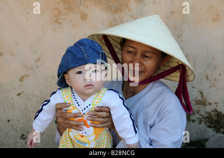 Vietnamese grandmother and baby boy Hue Vietnam Stock Photo