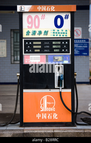 Petrol pump showing fuel prices at filling station in Guilin China Stock Photo
