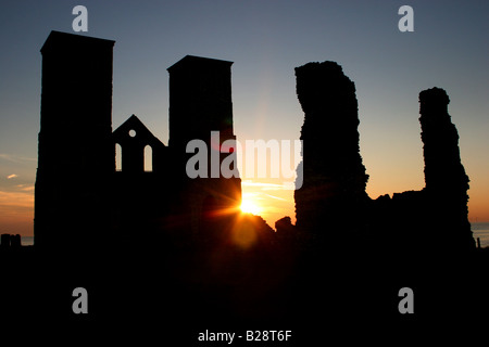 Twin towers of Reculver Church viewed from the east. A Roman fort surrounded this site. Reculver, Kent, England Stock Photo