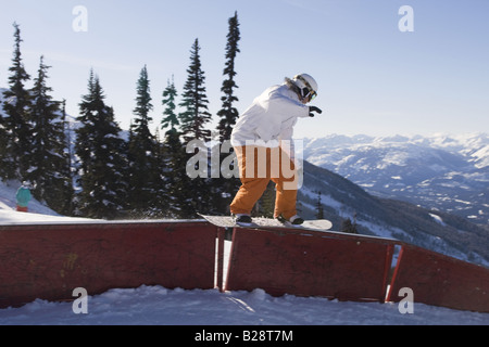 Snowboarders enjoying the snowboard park Whistler British Columbia Canada Stock Photo
