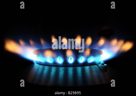 Blue yellow Flames from a burner Stock Photo