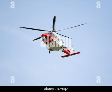 Westland HM Coast Guard rescue helicopter G-CGIJ coming in to land at Bournemouth Airport, Dorset. UK. Stock Photo