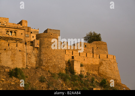 Two of the ninety nine BASTIONS of the outer wall of JAISALMER FORT built in 1156 on Trikuta Hill out of sandstone RAJASTHAN IND Stock Photo