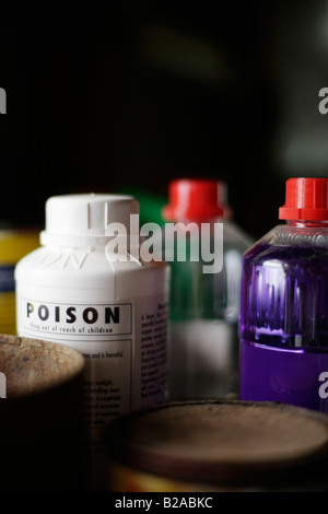 Poisonous household products in a garden shed Methylated spirits turpentine paint stripper Stock Photo