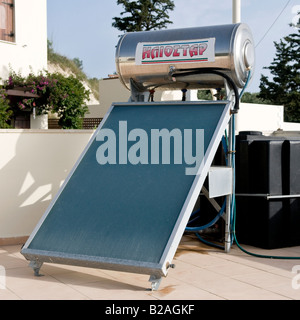 Roof mounted solar panel for domestic water heating. Stock Photo