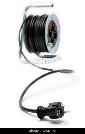 Electric extension prong and reel in white background Stock Photo