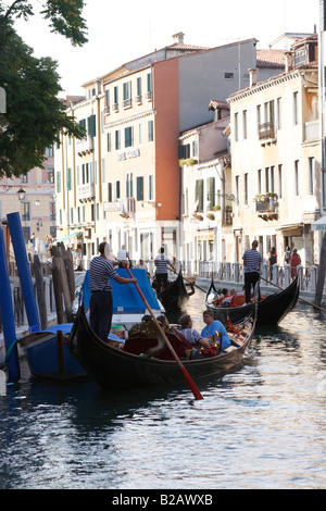 A gondola trip along the Venice water channels Stock Photo - Alamy