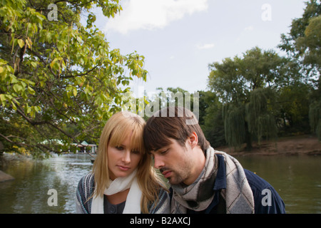 Man and woman close-up in city park Stock Photo