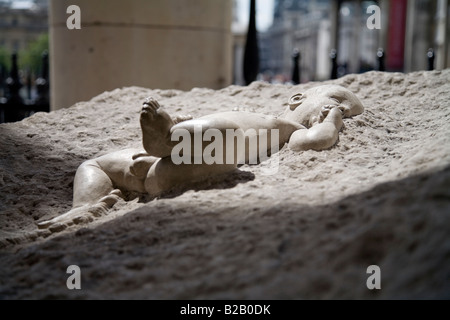 In the beginning sculpture of a new born baby at St Martin in the Fields Church London England UK Stock Photo