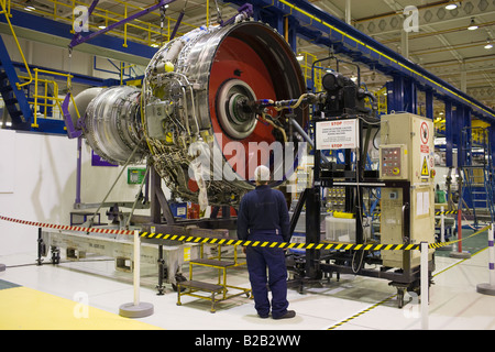 Enginer works on a Rolls Royce jet engine in the production factory Derbyshire United Kingdom Stock Photo