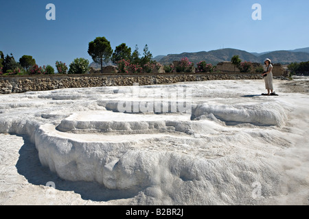 The calcite terraces and sulfur water pools at Pamukalle Turkey Stock Photo