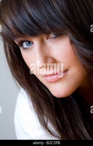 Portrait young woman with blue eyes, smiling Stock Photo