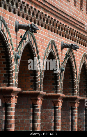 Sculpted figures over pointed arches of the Oberbaum Oberbaumbrücke Bridge built in 1896 in the North German Brick Gothic style in Berlin Germany Stock Photo