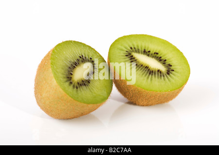 Kiwi (Actinidia deliciosa), cut into halves Stock Photo