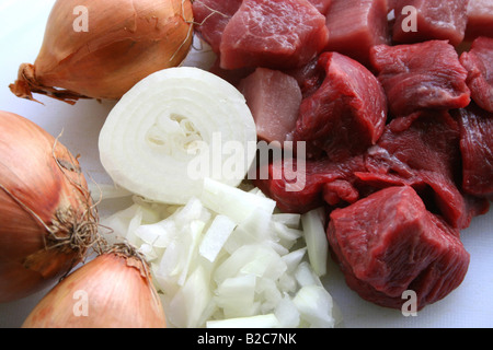 Raw beef goulash and onions, goulash preparation Stock Photo