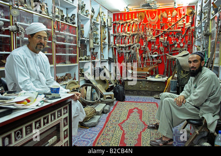 Shop selling old traditional souvenirs in souq of Mutrah old Muscat Oman Stock Photo