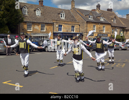 The Westminster Morris Dancers in full flight in Stow-on-the-Wold Stock Photo