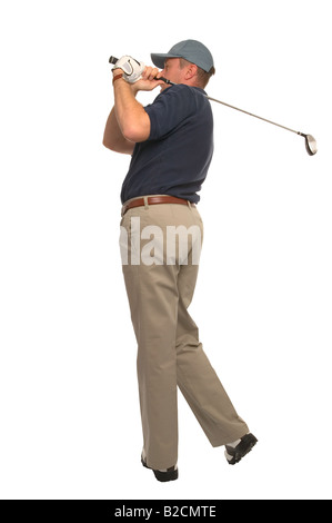 Studio shot of a golfer watching his ball flight Stock Photo