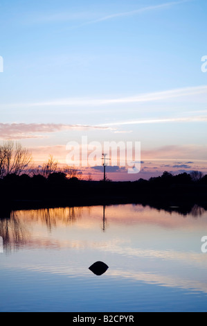 Beautiful lake water surface at sunset Stock Photo - Alamy