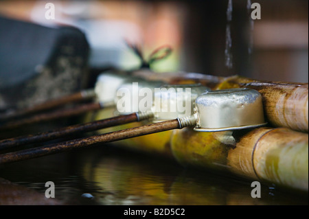 Japan, Nara, Kofuku-ji Temple, Row of ladles, close-up Stock Photo