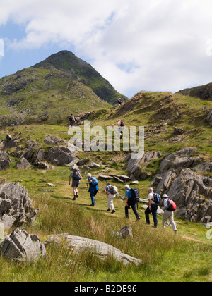 Group of Welsh Ramblers walking up Cnicht mountain in Snowdonia National Park  in summer. Snowdonia North Wales UK Stock Photo