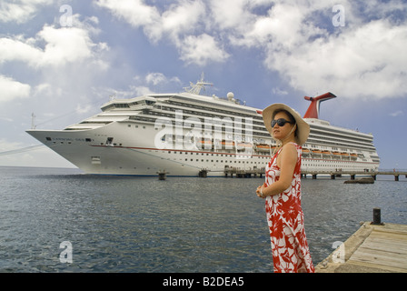 Carnival Destiny cruise ship in Caribbean island port of Roseau, Dominica Stock Photo