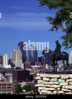 Kansas City Skyline with lone figure on horseback sculpture Stock Photo