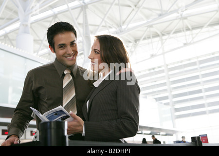 Happy businesspeople at the airport. Stock Photo