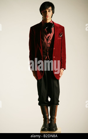 Young stylish man posing, studio shot. Stock Photo