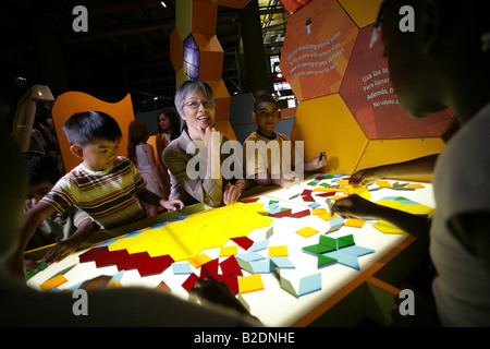 Students and art teacher in art class. Stock Photo