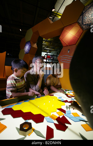 Students and art teacher in art class. Stock Photo