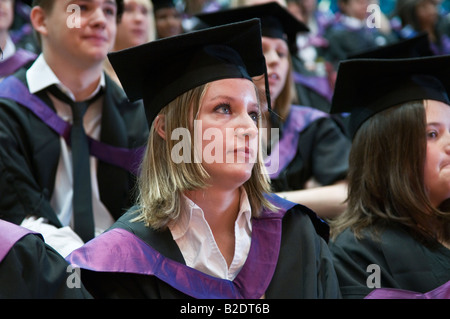 Aberystwyth University graduation day 2008 - students wearing mortar boards and gowns waiting to receive degrees, Wales UK Stock Photo