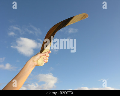 Detail of person throwing boomerang Stock Photo