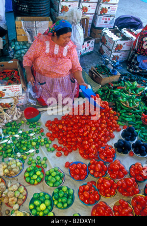 Mexican, Zapotec, Zapotecan, woman, fruit and vegetable vendor, open-air market, village, Tlacolula de Matamoros, Tlacolula, Oaxaca State, Mexico Stock Photo