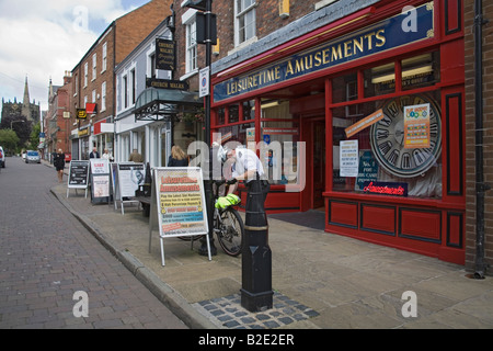 Ormskirk Lancashire England UK July A policeman unlocking his bicycle Stock Photo